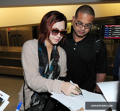 Demi (15) - Demi - December 10 - Arrives at the Miami International Airport