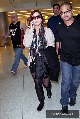 Demi (18) - Demi - December 10 - Arrives at the Miami International Airport