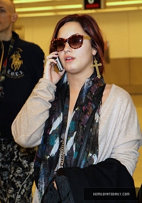 Demi (20) - Demi - December 10 - Arrives at the Miami International Airport