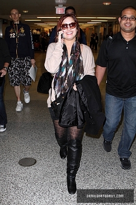 Demi (27) - Demi - December 10 - Arrives at the Miami International Airport