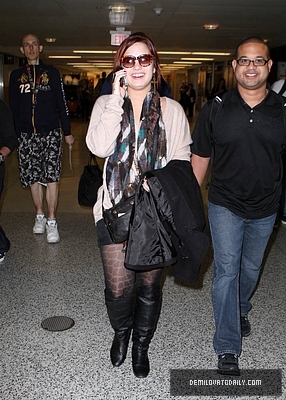 Demi (29) - Demi - December 10 - Arrives at the Miami International Airport