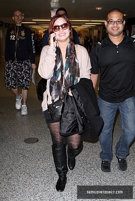 Demi (30) - Demi - December 10 - Arrives at the Miami International Airport