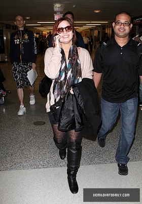 Demi (31) - Demi - December 10 - Arrives at the Miami International Airport