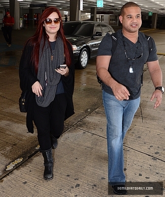 Demi (1) - Demi - December 15 - Arrives at the San Juan International Airport Puerto Rico