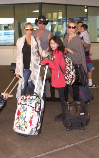 s003 - Miley Cyrus At Nashville Airport