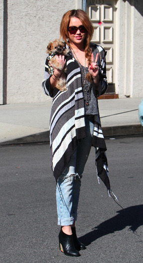 006 - Miley Cyrus Carrying her Yorkshire Shooter in Toluca Lake