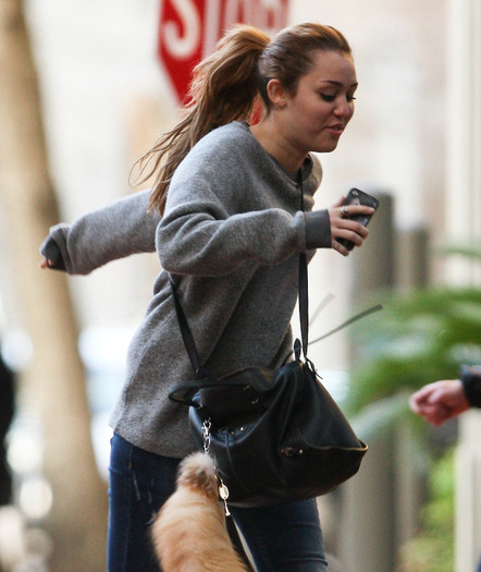 004 - Miley Cyrus Walking in New Orleans