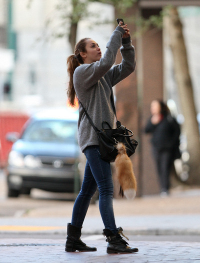 007 - Miley Cyrus Walking in New Orleans