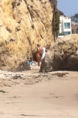 normal_004~300 - Miley Cyrus At a beach in California