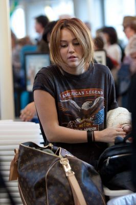 2 - Miley Cyrus At LAX Departing To Ecuador