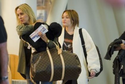 3 - Miley Cyrus At LAX Departing To Ecuador