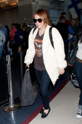 9 - Miley Cyrus At LAX Departing To Ecuador