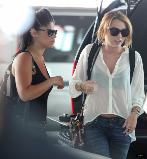 6 - Miley Cyrus At the Airport in Mexico - May 27
