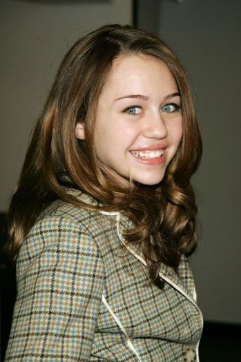 8 - Miley Cyrus At Disney Press Conference - 09 02 2006