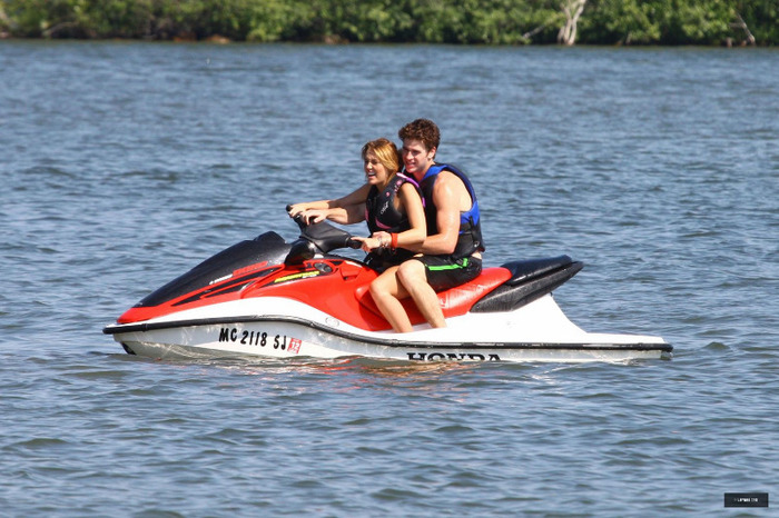 27 - Miley Cyrus At the Beach in Michigan - July 31