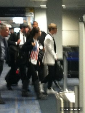 normal_tumblr_lw2zyqP1um1qet1yko1_500_large - Selena Gomez Leaving Washington with Justin - December 11