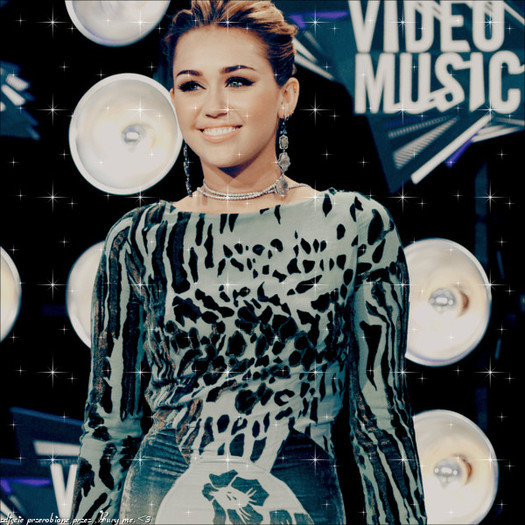 4 - Miley Cyrus Glittery Pics