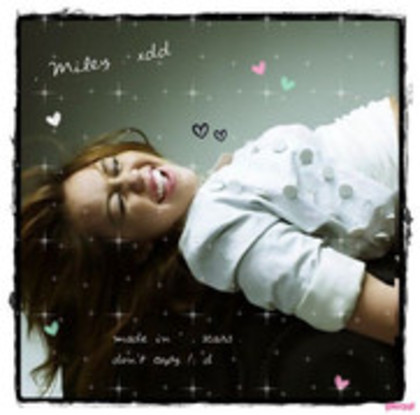 26804960_UHLFIMIHP - Miley Cyrus Glittery Pics