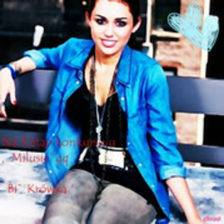 28660514_JSOLAOWZJ - Miley Cyrus Glittery Pics