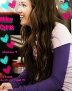 29432553_IEQRGBWOF[1] - Miley Cyrus Glittery Pics