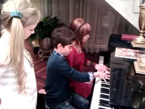 Debby Ryan gives Cameron a quick piano lesson 002 - Gives - Cameron - a - quick - piano - lesson