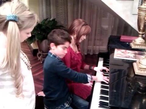 Debby Ryan gives Cameron a quick piano lesson 013