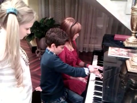Debby Ryan gives Cameron a quick piano lesson 022