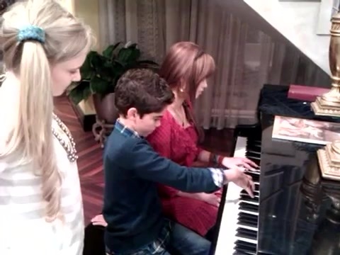 Debby Ryan gives Cameron a quick piano lesson 026