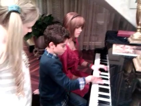 Debby Ryan gives Cameron a quick piano lesson 035