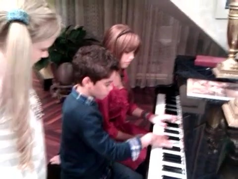 Debby Ryan gives Cameron a quick piano lesson 036