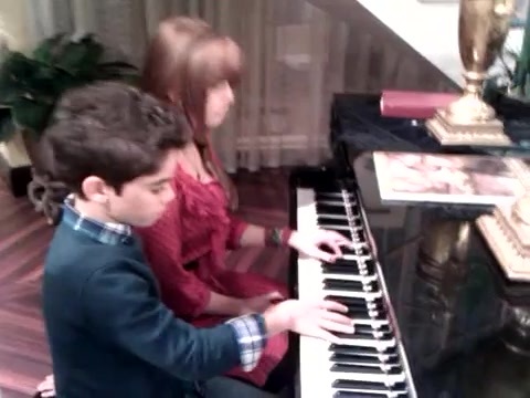Debby Ryan gives Cameron a quick piano lesson 041