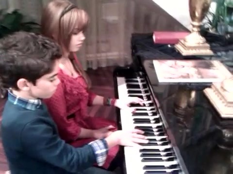 Debby Ryan gives Cameron a quick piano lesson 043