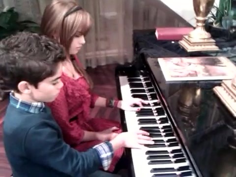 Debby Ryan gives Cameron a quick piano lesson 044