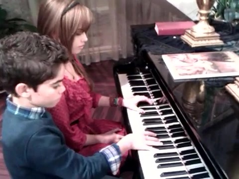 Debby Ryan gives Cameron a quick piano lesson 046