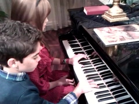 Debby Ryan gives Cameron a quick piano lesson 053