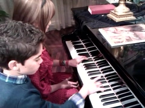 Debby Ryan gives Cameron a quick piano lesson 054