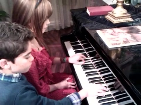 Debby Ryan gives Cameron a quick piano lesson 059