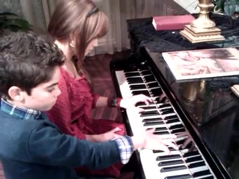 Debby Ryan gives Cameron a quick piano lesson 071