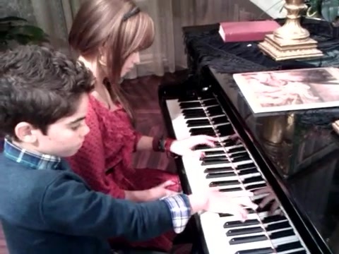 Debby Ryan gives Cameron a quick piano lesson 072