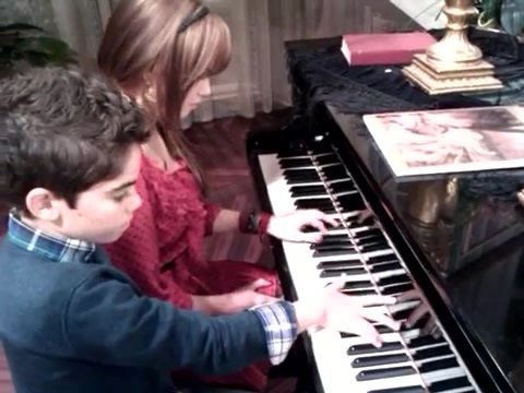 Debby Ryan gives Cameron a quick piano lesson 073