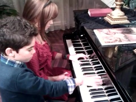 Debby Ryan gives Cameron a quick piano lesson 074