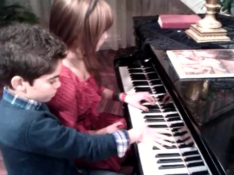 Debby Ryan gives Cameron a quick piano lesson 077