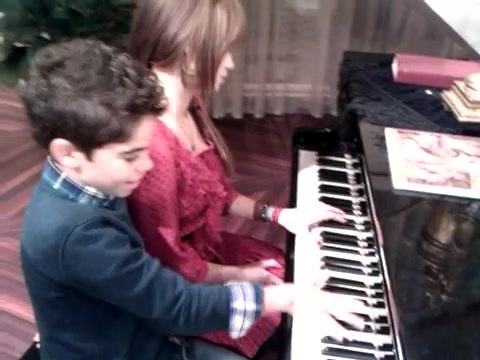 Debby Ryan gives Cameron a quick piano lesson 082