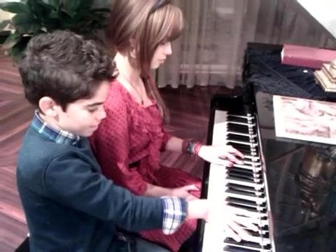 Debby Ryan gives Cameron a quick piano lesson 084