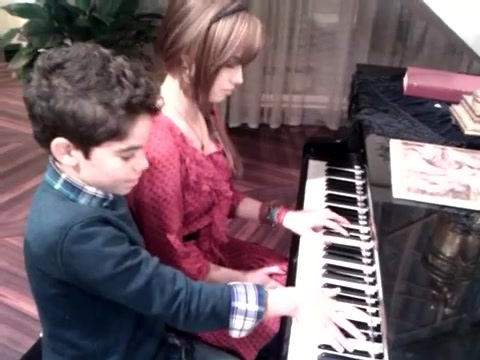 Debby Ryan gives Cameron a quick piano lesson 085