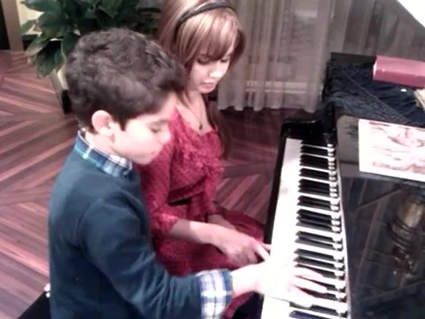 Debby Ryan gives Cameron a quick piano lesson 094