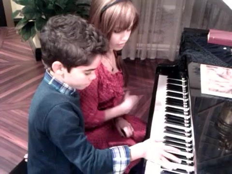 Debby Ryan gives Cameron a quick piano lesson 098