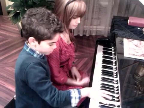 Debby Ryan gives Cameron a quick piano lesson 100