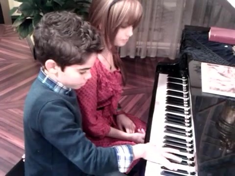 Debby Ryan gives Cameron a quick piano lesson 101