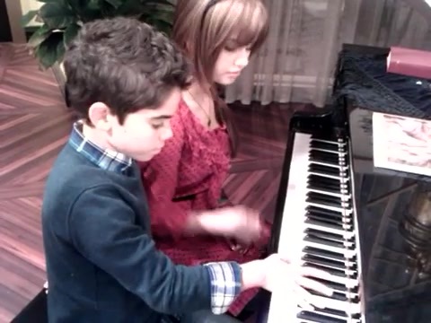 Debby Ryan gives Cameron a quick piano lesson 103